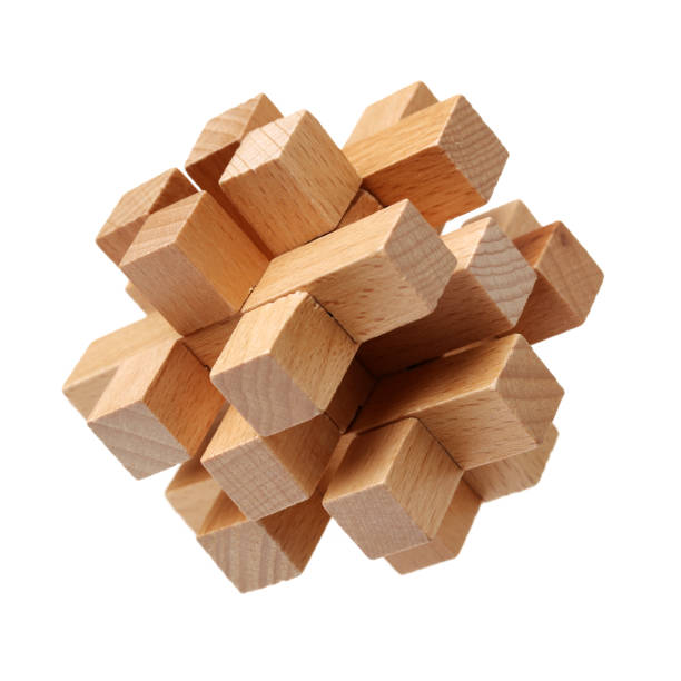 un puzzle geometrico fatto di legno su sfondo bianco - cube puzzle three dimensional shape block foto e immagini stock