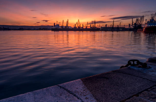 istock Autumn sunset at the sea station with ships. 1086547078