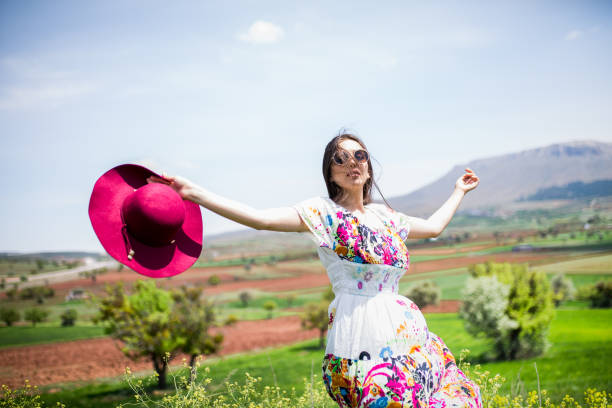 istock female model photography between flowers 1086547536