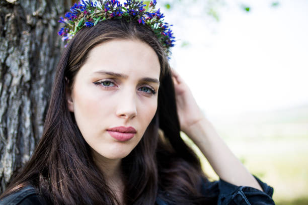 istock female model photography between flowers 1086547540