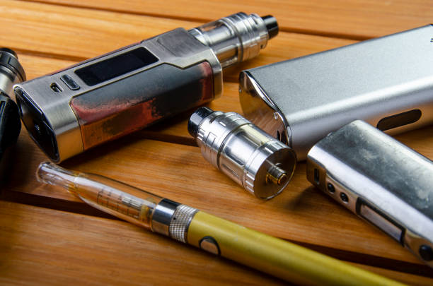 istock vape devices and electronic cigarette, ecig and mods background. 1086551050