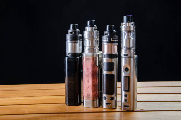 istock vape devices and electronic cigarette, ecig and mods background. 1086551066