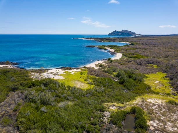 istock San Cristobal Island, Galapagos, seen from Cerro Brujo Beach 1086558272