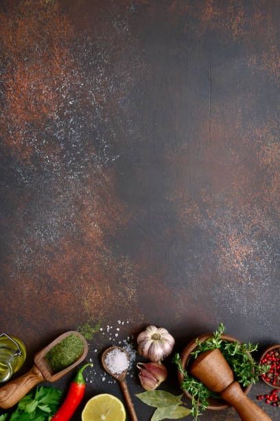 istock Culinary background with selection of spices, herbs and greens 1086565978