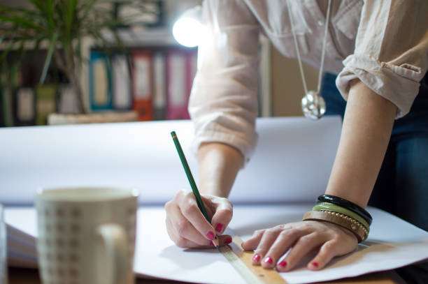 istock Young woman working in her office 1086566104