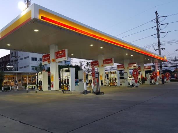 Shell international oil and gas company logo on fuel station Bankkok, thailand - December, 2018: Shell petrol station in bankkok, Thailand on December 24, 2018. oil pump petroleum equipment development stock pictures, royalty-free photos & images