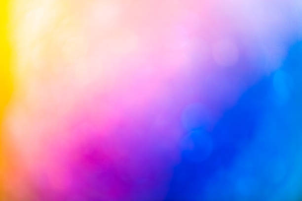 istock Defocused colorful bokeh texture. Bright saturated spring colors 1086572372