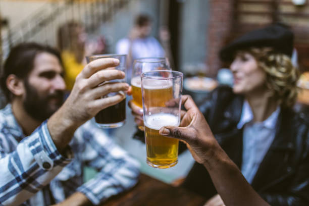 istock Friends having good time at pub 1086581630