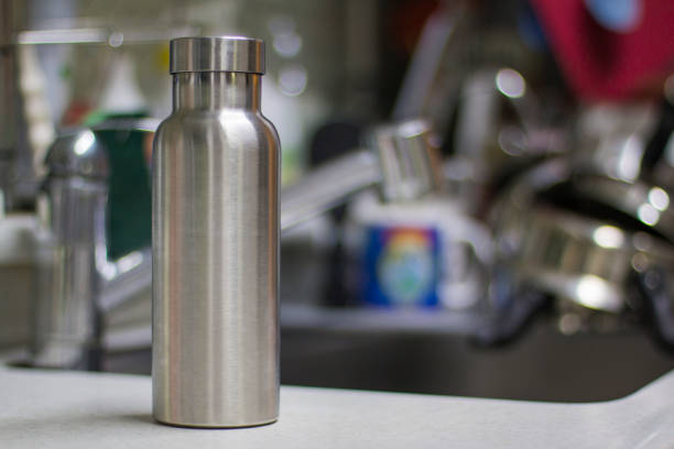 istock Insulated Stainless Bottle with utensils on sink kitchen 1086586242