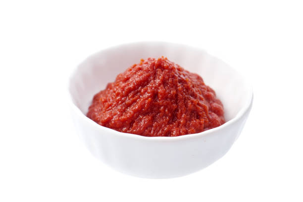 istock tomato sauce isolated on white background 1086586348