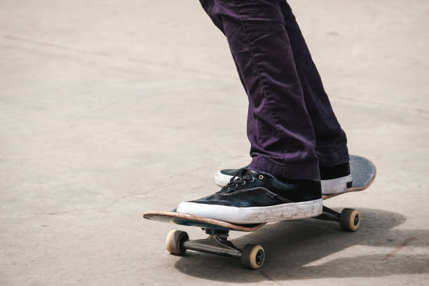 istock Feet of unknown man on skateboard 1086589884