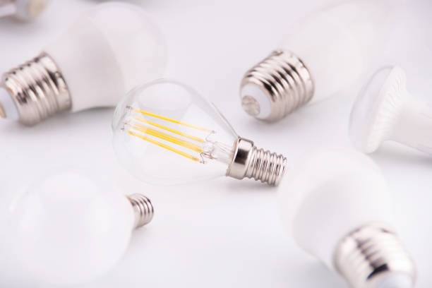 istock Led lamps lie on a white background. Theme energy saving in the house 1086590528