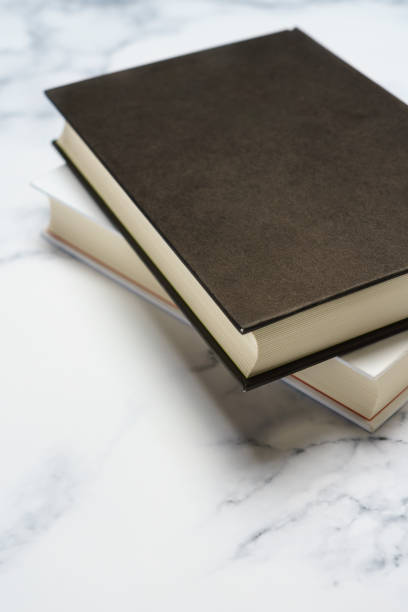 istock Blank hard cover book template on wooden background 1086594022