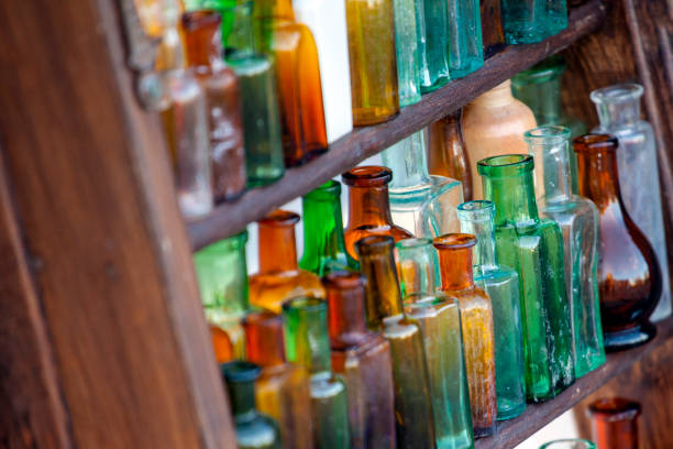 istock collection of old glass bottles 1086594476