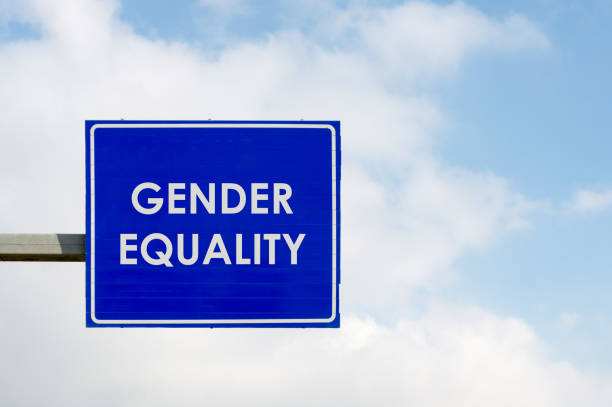 istock Gender Equality words displayed on blue road sign 1086596996