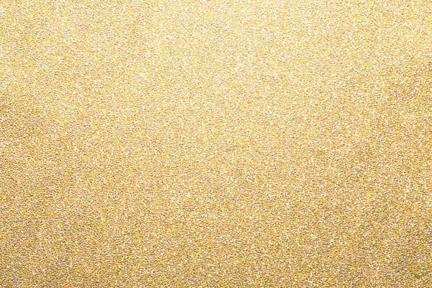 istock Gold glitter background, shiny paper defocused 1086598282
