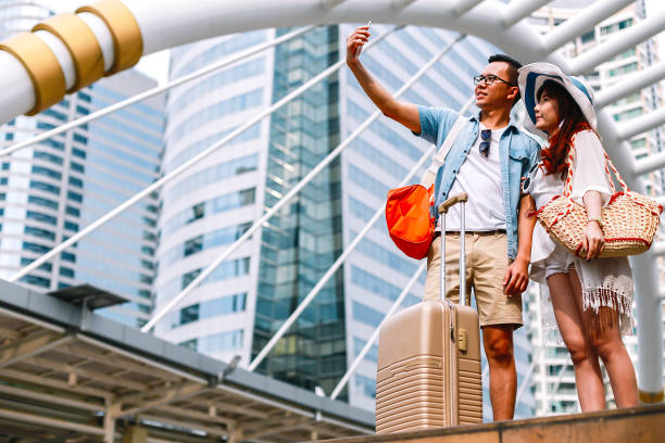 istock Tourists couples looking for a place in the city. 1086603278