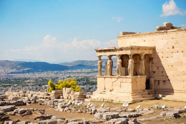Beautiful view on the 
Erechtheion of Athenian Acropolis, the architectural masterpiece of Ancient Greece. Touristic place to visit.