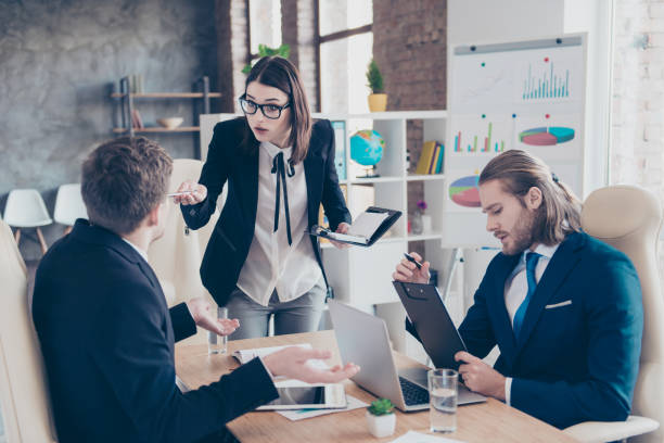 istock Three serious elegant classic business people, managers wearing 1086610570