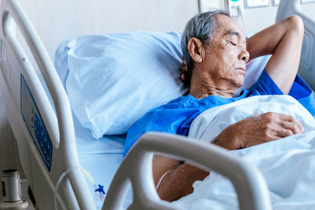 istock Elderly patients in hospital bed 1086612814