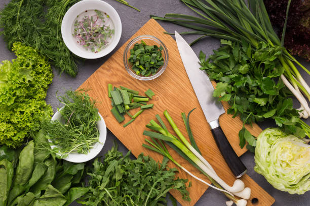 istock Cooking fresh detox salad on kitchen table 1086614054