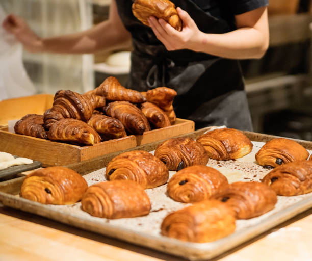 istock Close-up on freshly made chocolate croissants. 1086618512