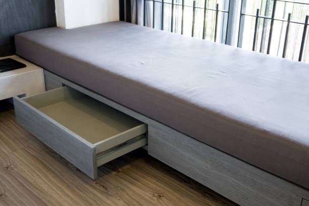 istock Wooden drawer under the bed 1086619102