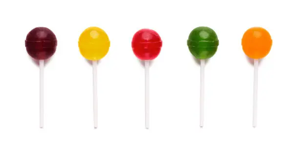 Assorted colors lollipops isolated on white background