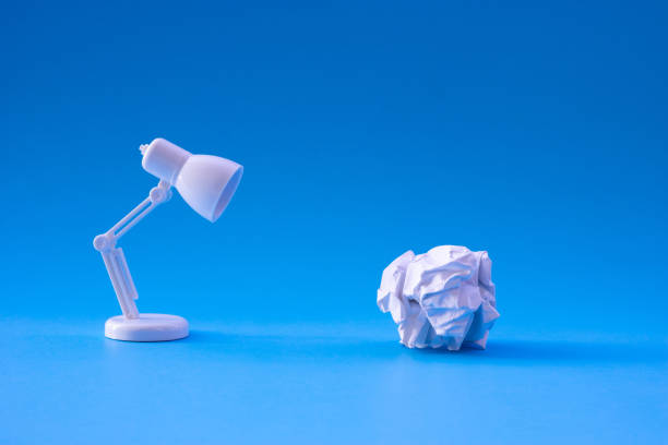 istock Ideas and creativity concepts with paper crumpled ball and lamp 1086624728