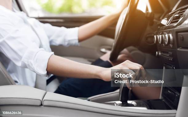 Business Woman Driver Shifting Automatic Transmission And Driving Stock Photo - Download Image Now