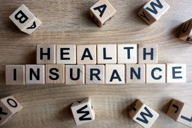 health insurance text from wooden blocks - insurance law insurance agent protection imagens e fotografias de stock