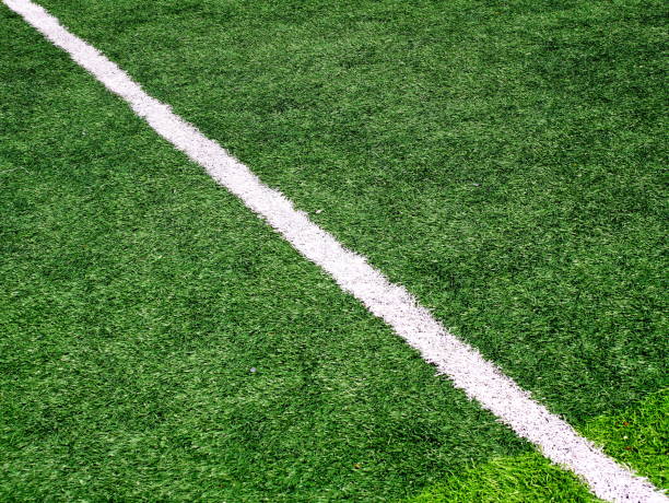 istock Green grass football pitch 1086632230