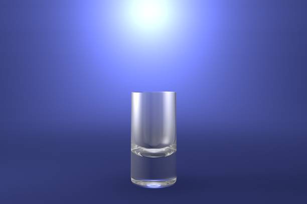 istock 3D illustration of vodka shot glass on light blue highlighted artistic background - drinking glass render 1086632308