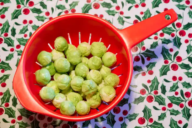 Brussel sprouts Christmas festive food in red bowl uk