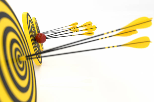 istock three yellow arrows in the yellow targets and a red apple 1086637832