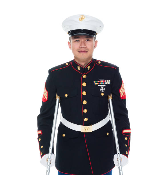 istock US Marine in uniform with cruches 1086643204