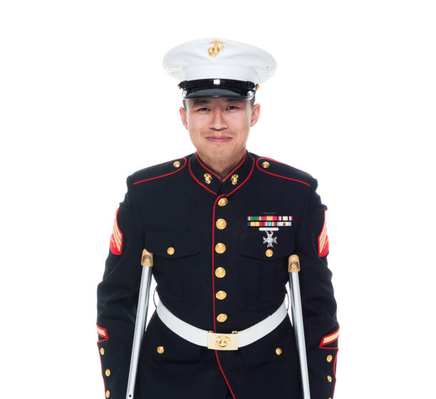 istock US Marine in uniform with cruches 1086643210