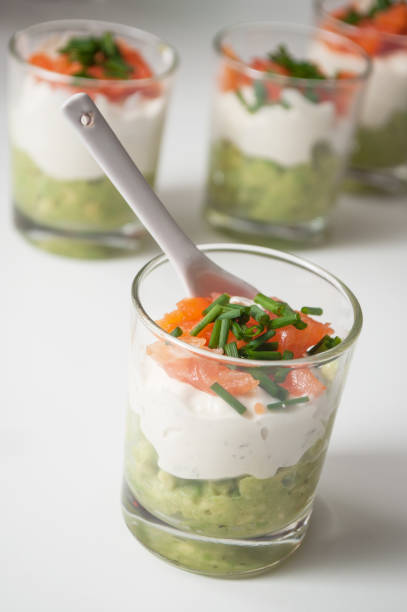 istock appetizers in little glasses on white background 1086643332