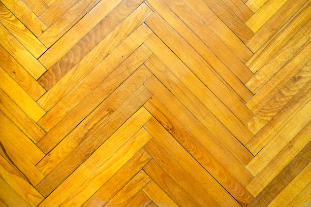 top view of floor with herringbone parquet from oak wood