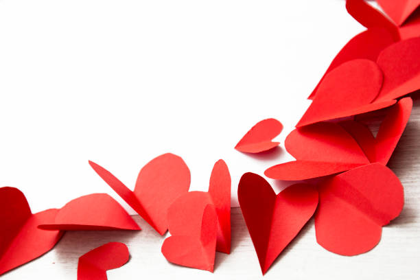 istock Hearts cut from red paper 1086646310