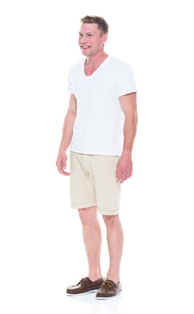 istock Handsome man in shirt and shorts 1086648612