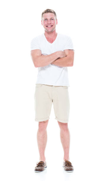 istock Handsome man in shirt and shorts has arms folded 1086648628