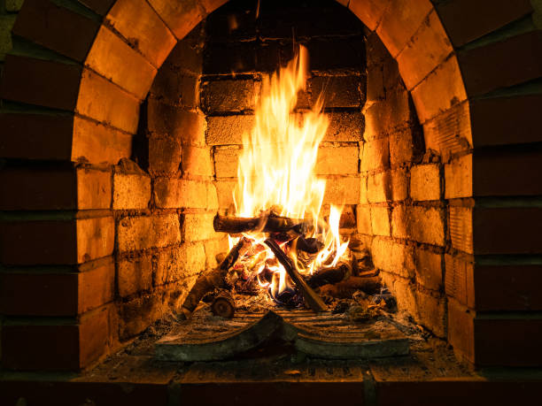istock front view of brick hearth with burning firewood 1086649590
