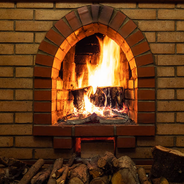 istock front view of stone fireplace and firewood 1086649598