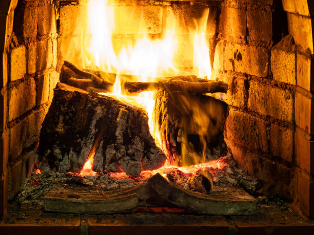 istock front view of burning firewood in hearth 1086649650