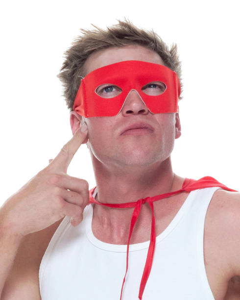 istock Man wearing pajamas and super hero cape 1086651668