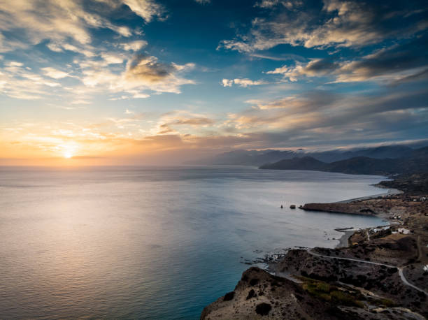 Scenic view of mountain and sea during sunset, Crete, Greece