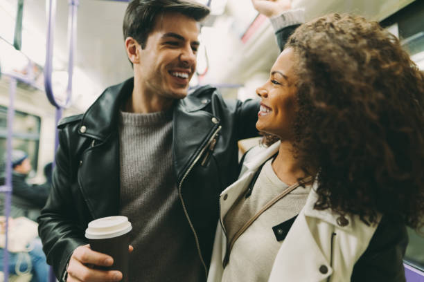 istock Couple flirting in the train 1086665162
