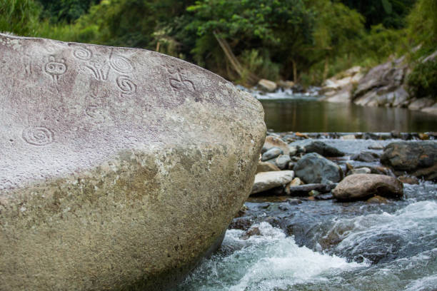 istock Ancient carved figures on stones in Jayuya Puerto Rico 1086669832