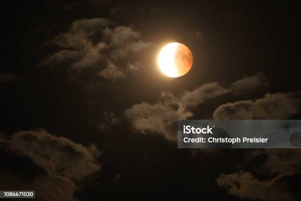 Moon Stock Photo - Download Image Now - Lunar Eclipse, Cloud - Sky, Dark